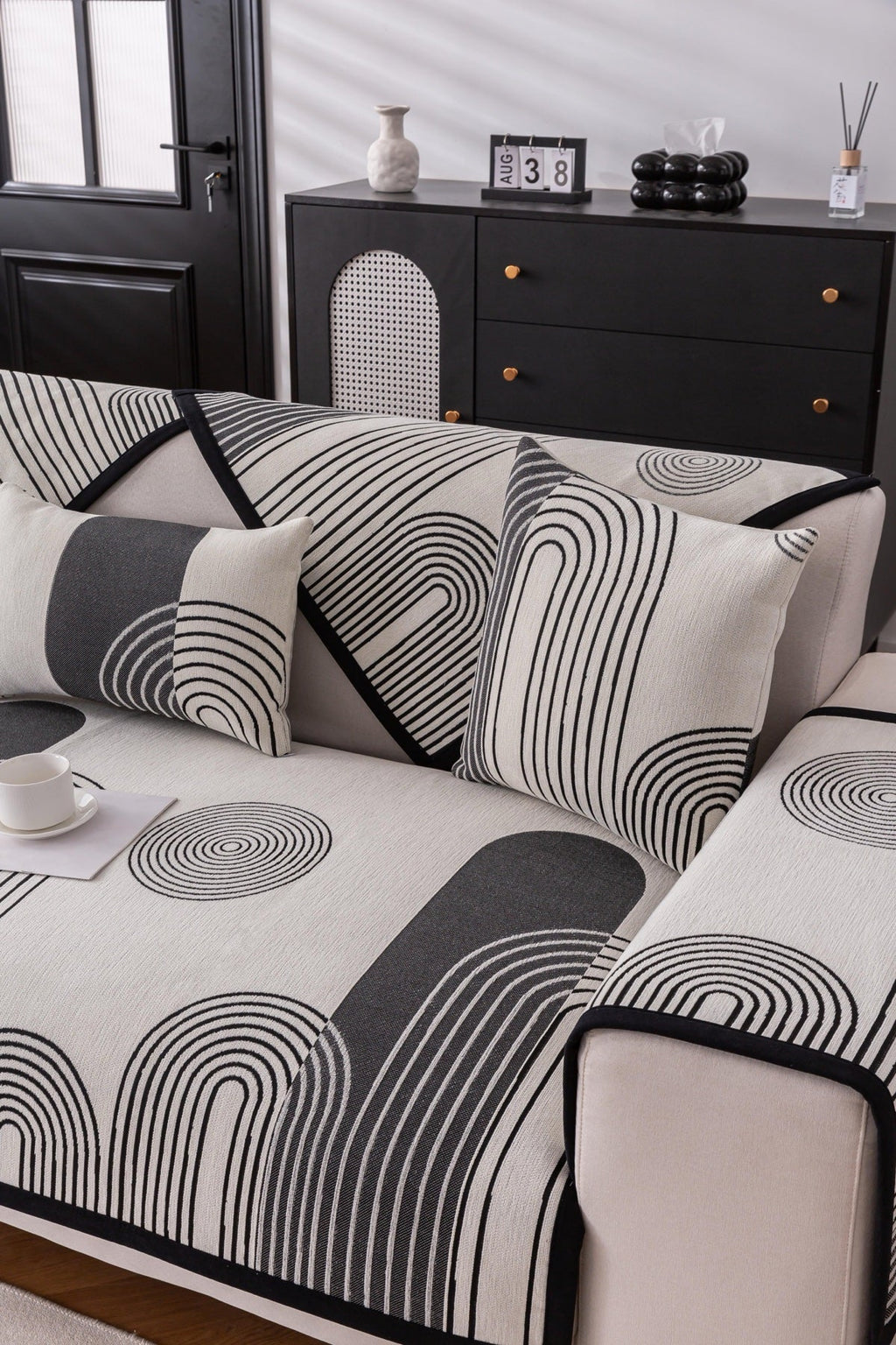 Decor Cedar Arcadia Arch Line Sofa Cover in Black Cream - styled sofa image for water resistant patterned couch covers in United States