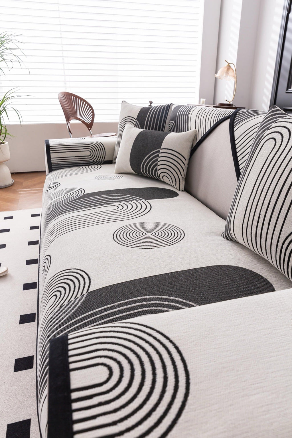 Decor Cedar Arcadia Arch Line Sofa Cover in Black Cream - styled sofa image for water resistant patterned couch covers in United States