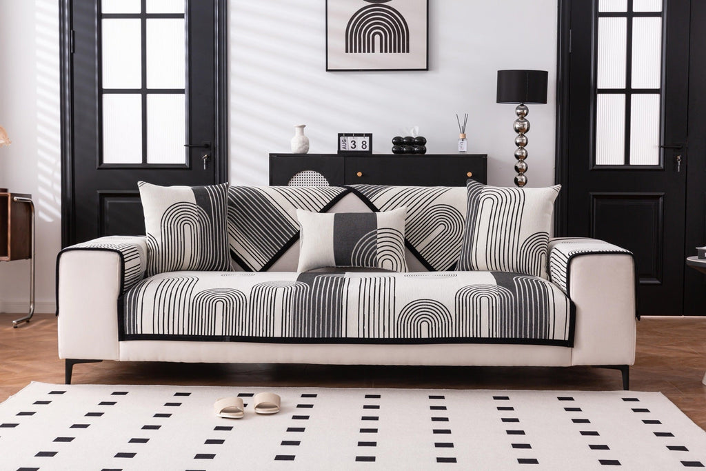 Decor Cedar Arcadia Arch Line Sofa Cover in Black Cream - styled sofa image for water resistant patterned couch covers in United States