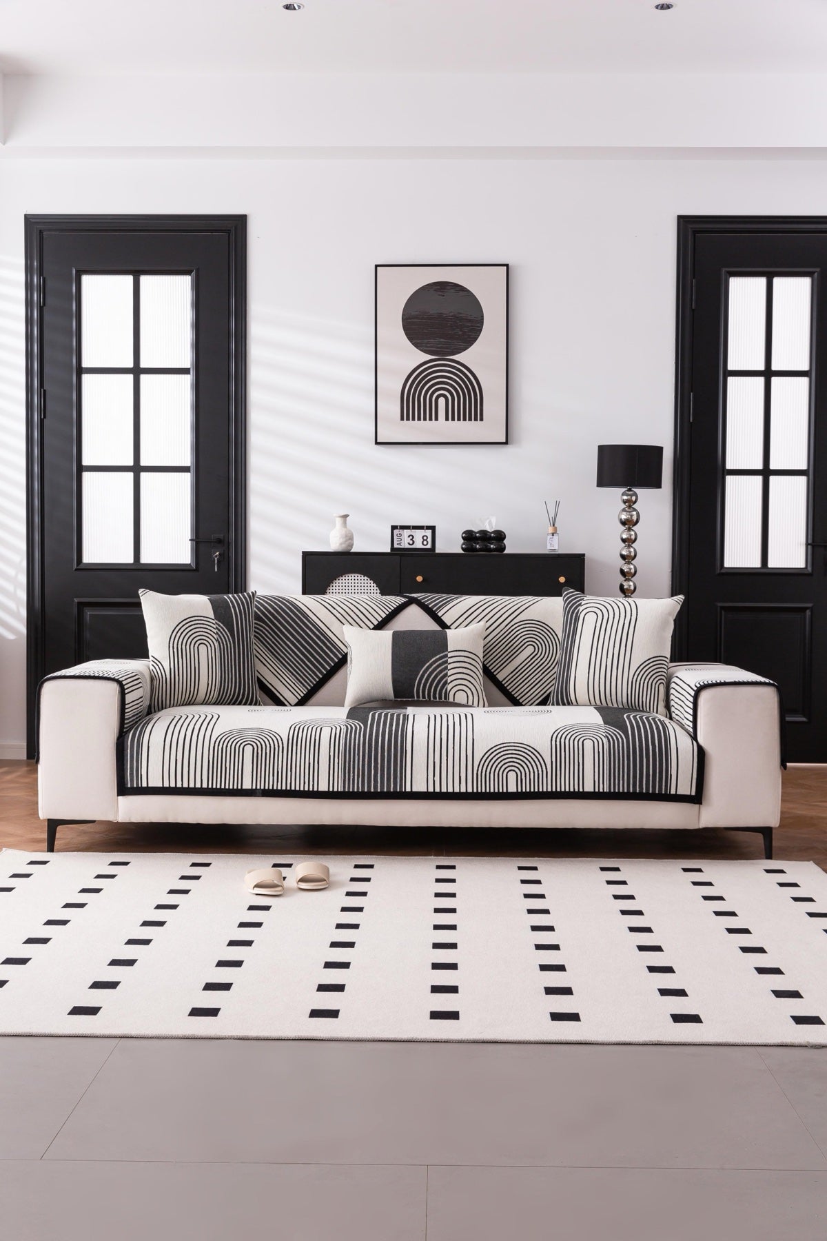 Decor Cedar Arcadia Arch Line Sofa Cover in Black Cream - styled sofa image for water resistant patterned couch covers in United States