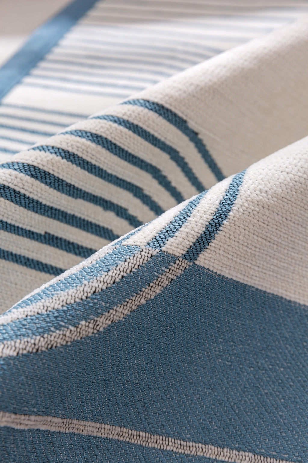 Decor Cedar Arcadia Arch Line Sofa Cover in Blue Cream - fabric texture detail image for water resistant patterned couch covers in United States