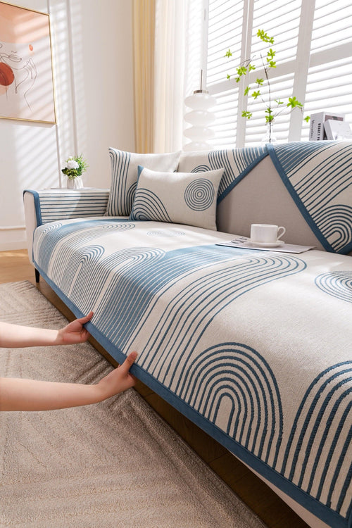 Decor Cedar Arcadia Arch Line Sofa Cover in Blue Cream - styled sofa image for water resistant patterned couch covers in United States
