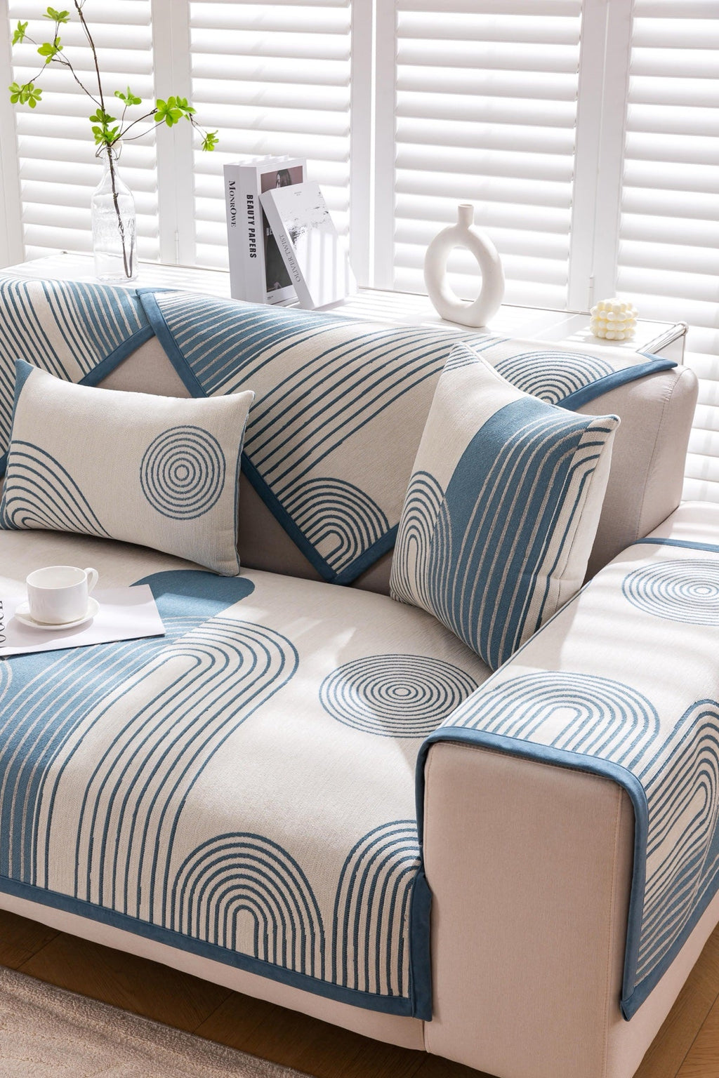 Decor Cedar Arcadia Arch Line Sofa Cover in Blue Cream - styled sofa image for water resistant patterned couch covers in United States