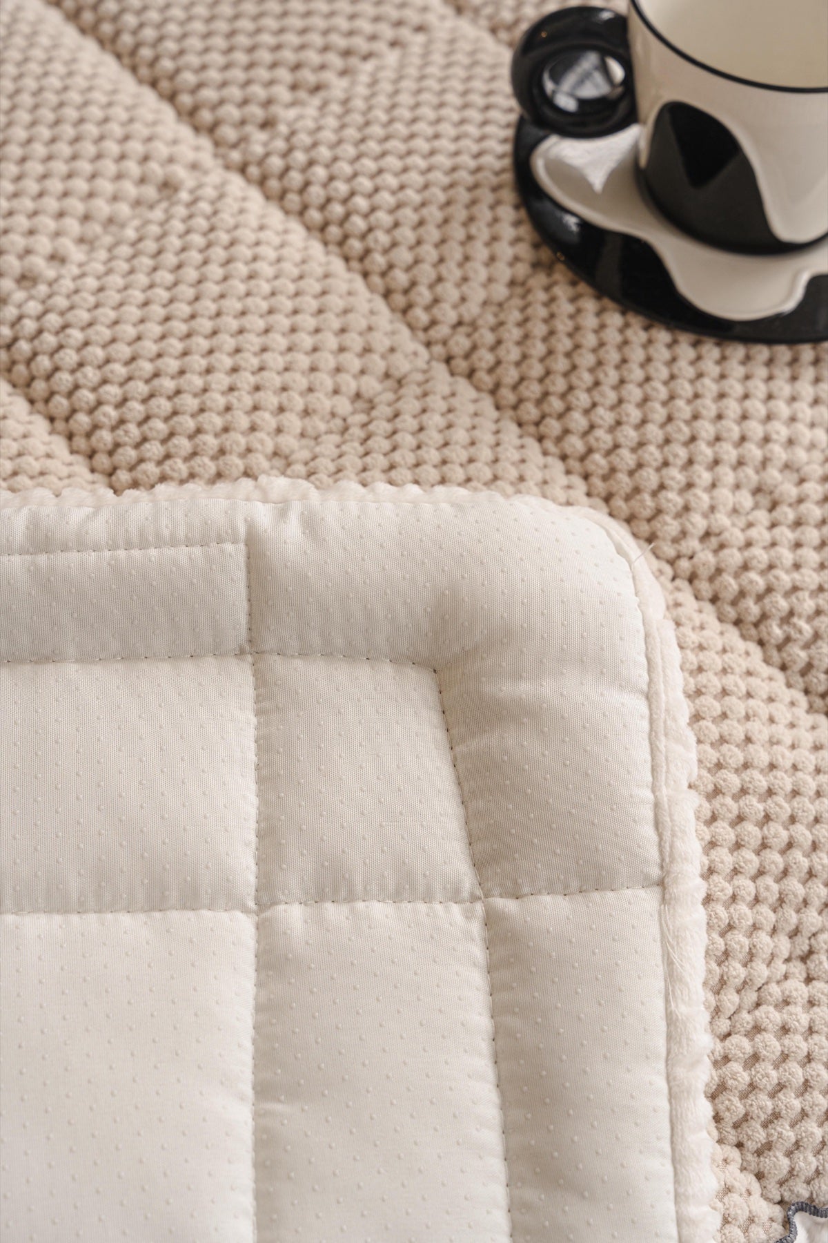 Decor Cedar Aspen Quilted Sherpa Sofa Seat Cover in Warm Taupe Sherpa - quilted fabric and sherpa edge detail for quilted sofa seat covers in United States