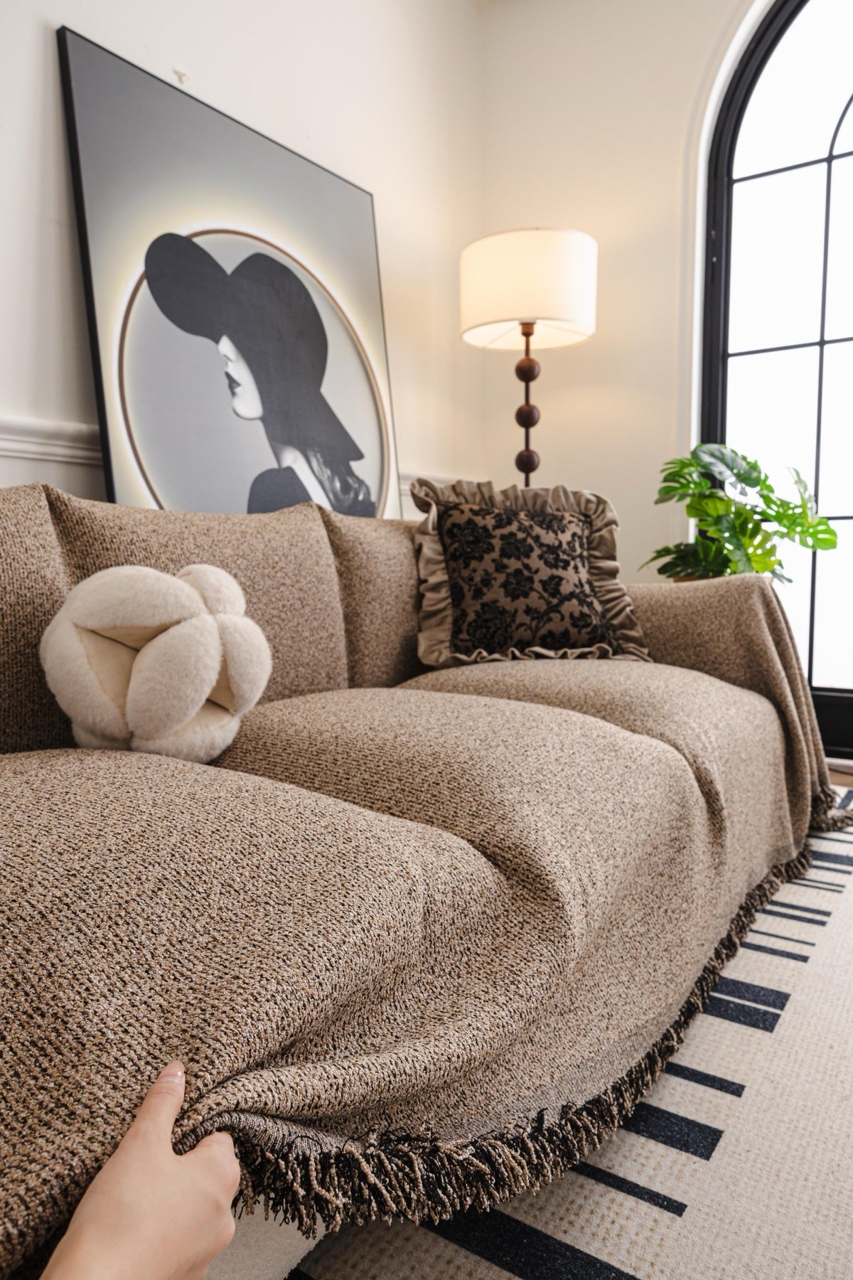 Decor Cedar Como Textured Boucle Fringe Sofa Throw Cover in Warm Taupe - textured boucle sofa throw cover hand and drape closeup in United States, image 8