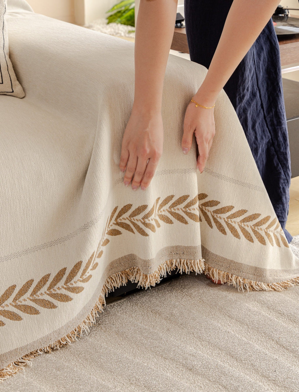 Decor Cedar Elowen Olive Border Sofa Throw Cover in Olive Border - olive border sofa throw cover hand and drape closeup in United States, image 20