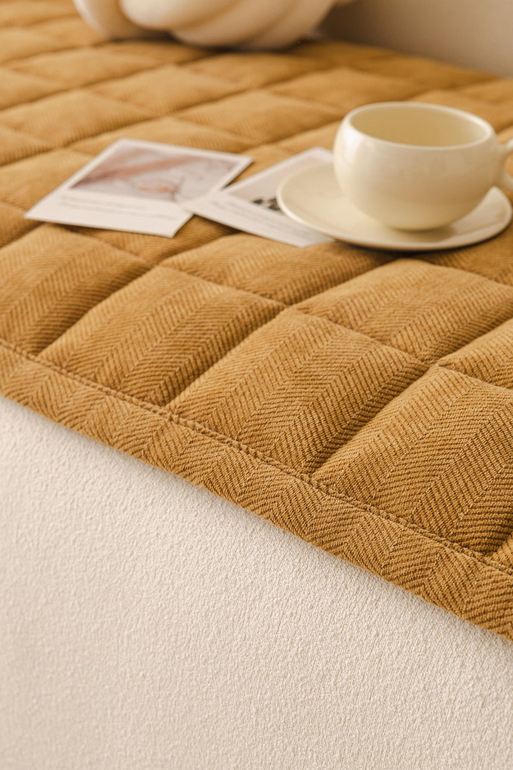 Decor Cedar Haven Quilted Corduroy Sofa Cover Piece in Ochre Gold - close sofa seat styling view for quilted corduroy sofa cover pieces in United States, image 23