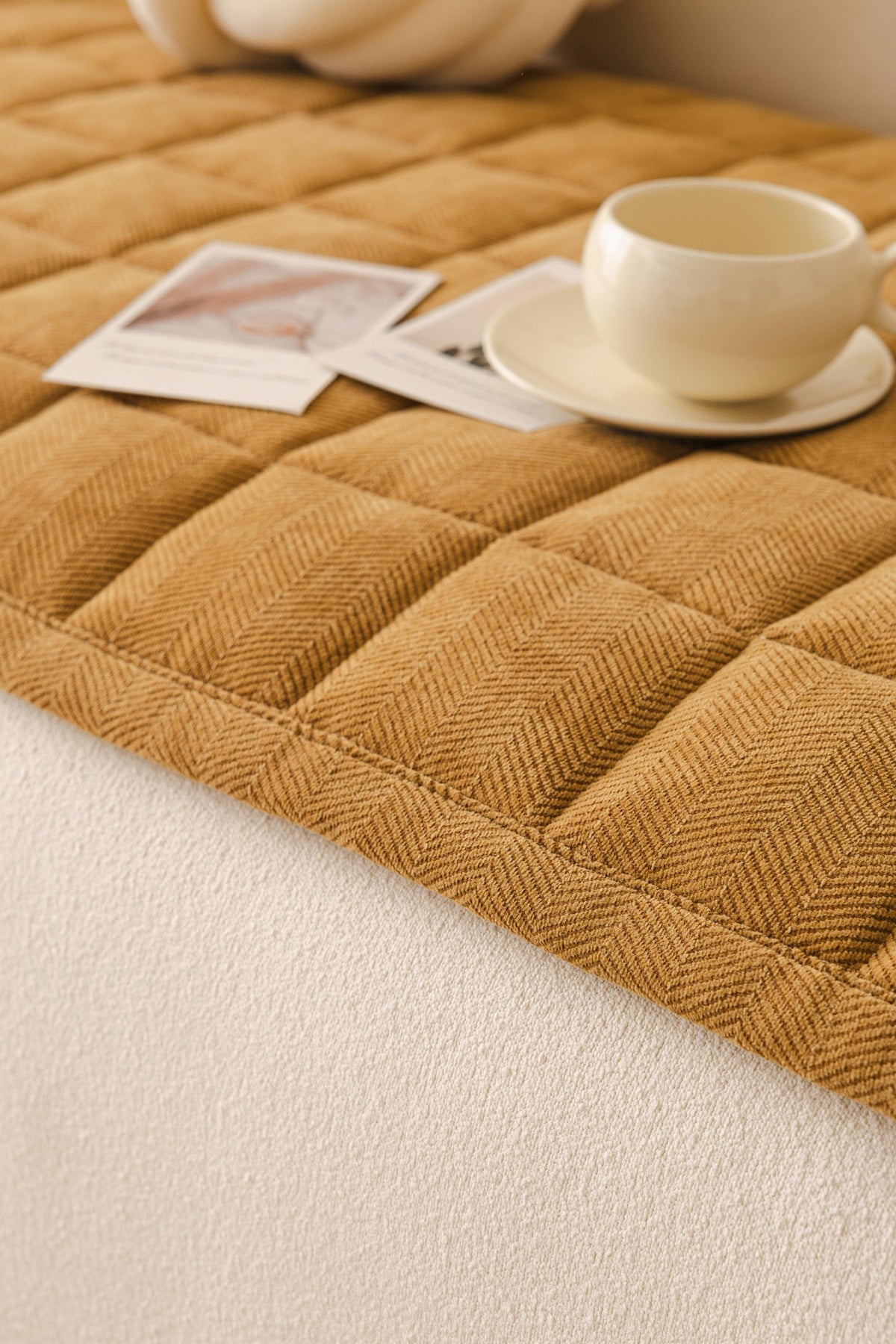 Decor Cedar Haven Quilted Corduroy Sofa Cover Piece in Ochre Gold - close sofa seat styling view for quilted corduroy sofa cover pieces in United States, image 23
